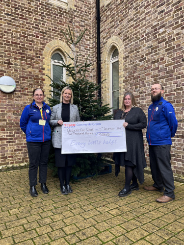 Tesco Staff Cheque Presentation